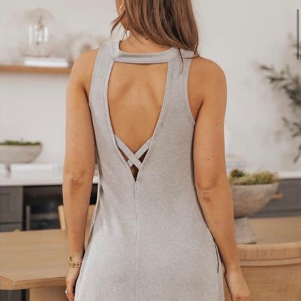 -Brand New This mini dress is ultra feminine
This dress is easy going and flowy.